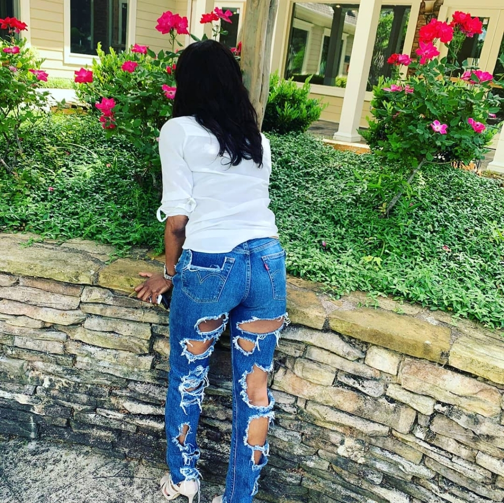 Customized Levi's in blue, white, and black.